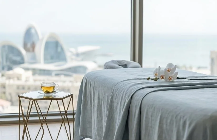 Treatment room with a view of the Flame Towers and the Caspian sea at The Port Baku Spa